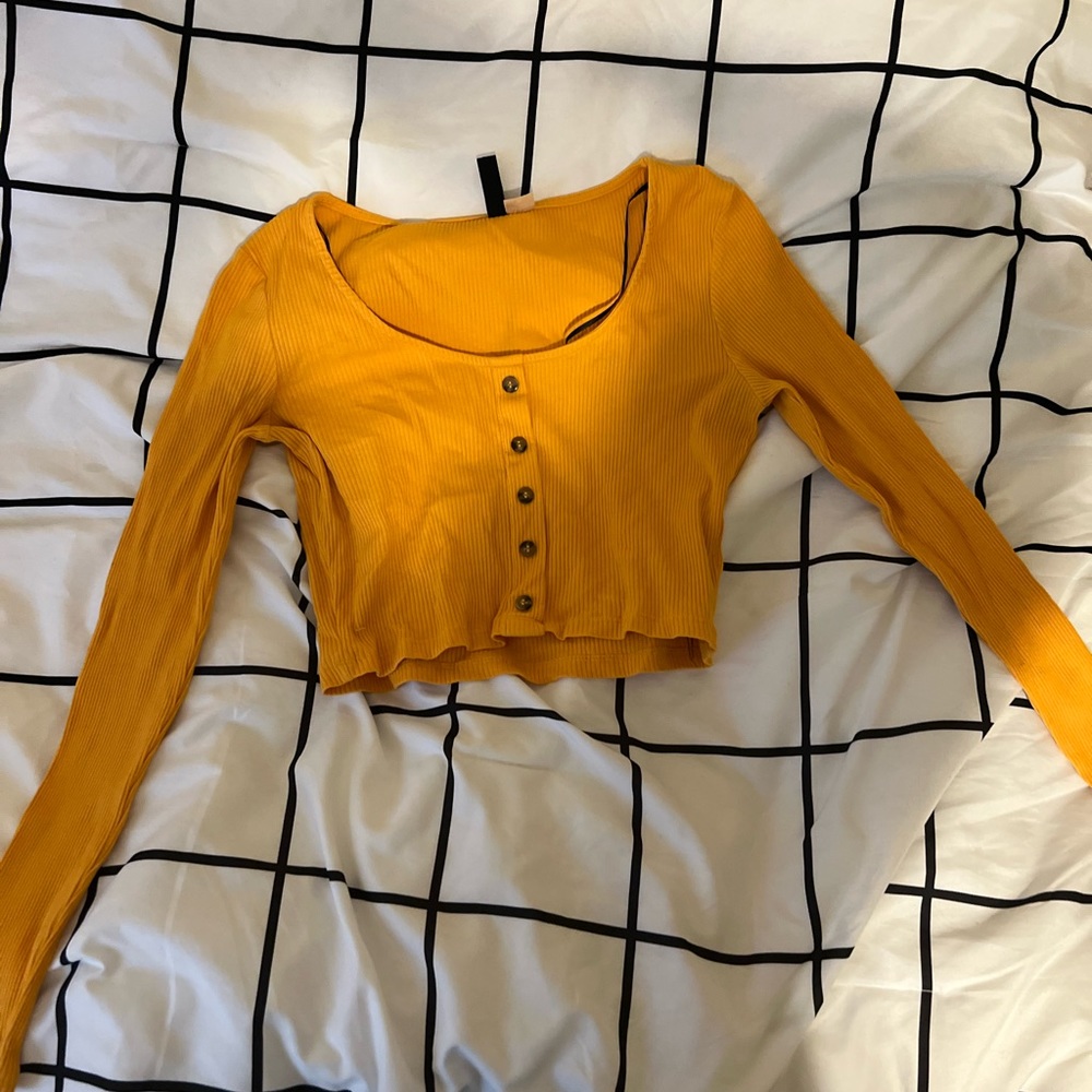 Yellow long-sleeve shirt